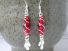 Bright red glass earrings wrapped with sterling silver